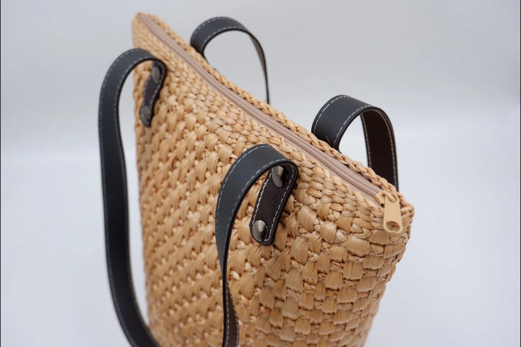 Straw beach tote with leather handle